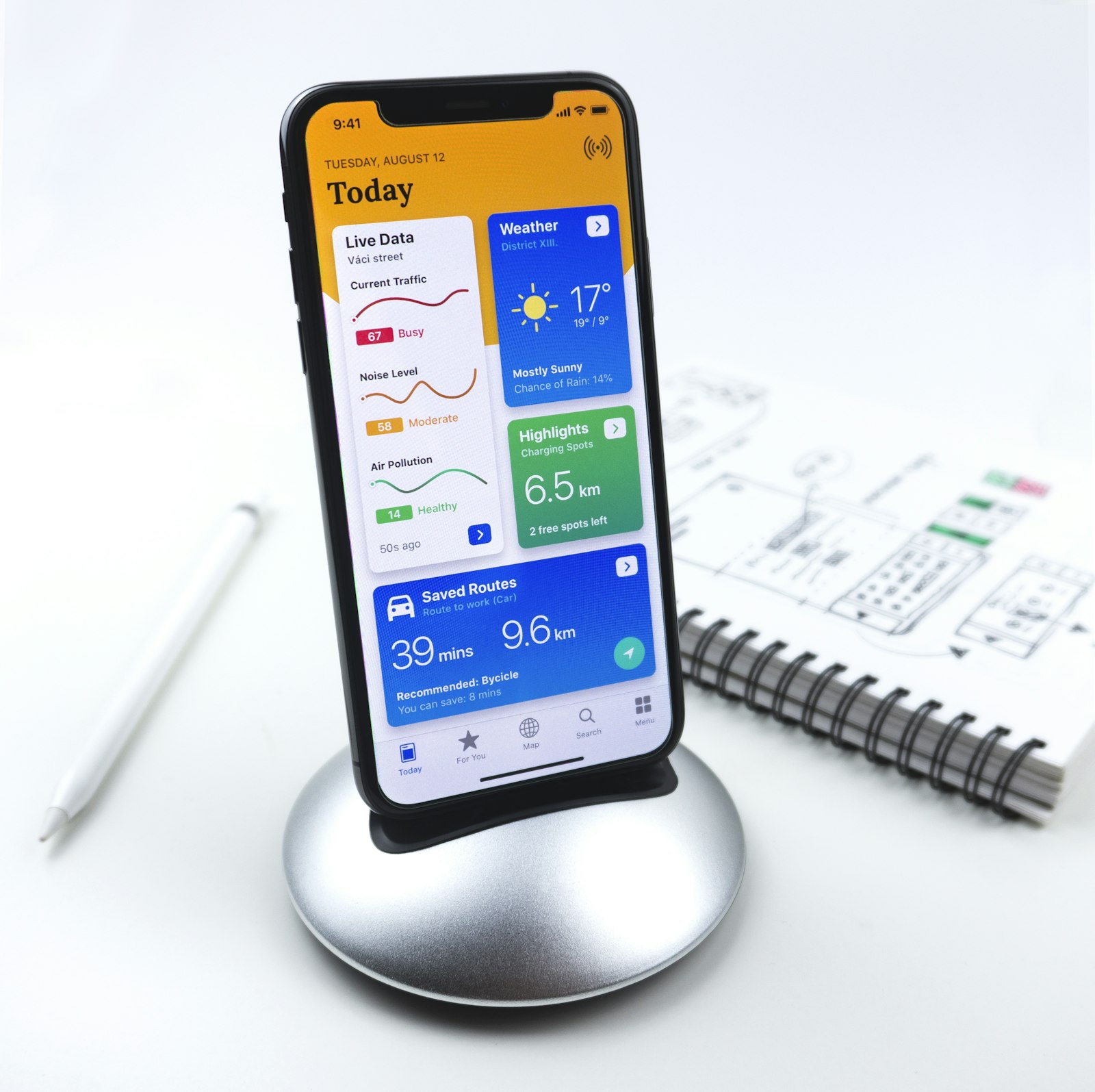 Smartphone on a desk with documents